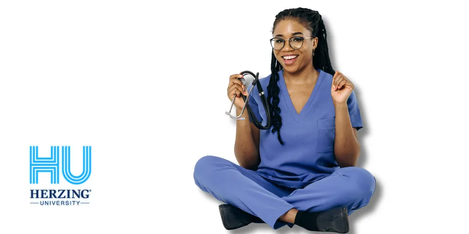 Smiling Woman sitting on ground with stethescope