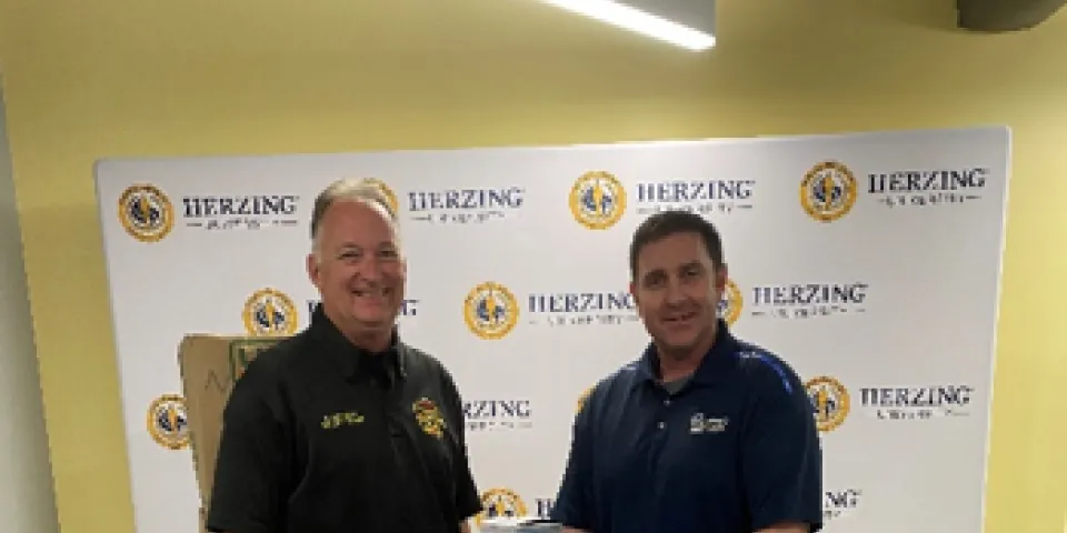 Herzing-New Orleans Campus President Jamie Hardage with Chief Stephen Schmitt 