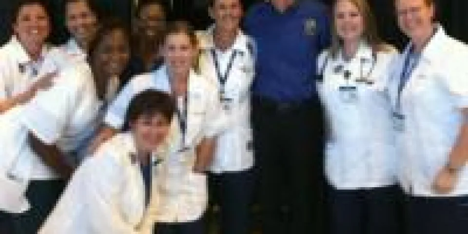 Herzing University Orlando nursing students in white coats