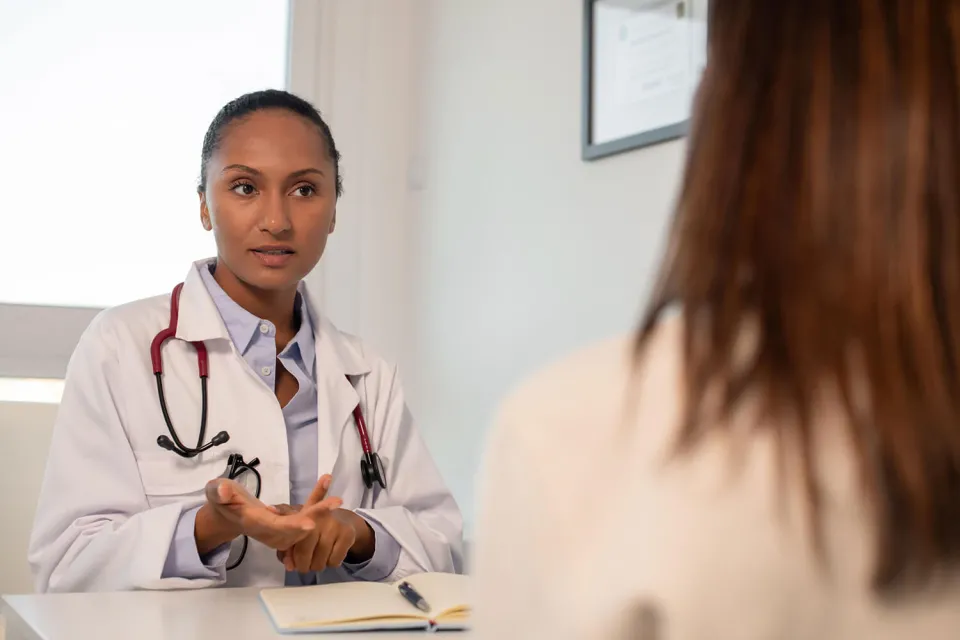 Nurse Practitioner Discussing Treatment Options with Patient