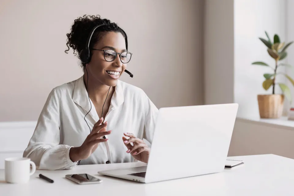 Billing and Coding Student Learning Online at Home on Laptop