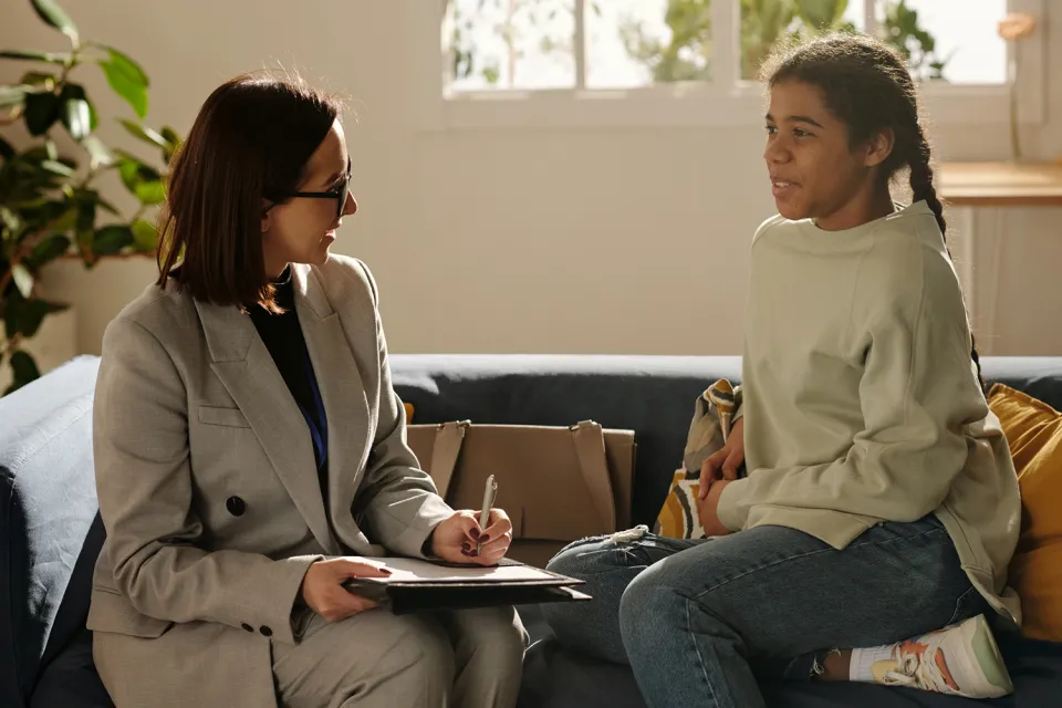 Social Worker Meeting with Young Patient